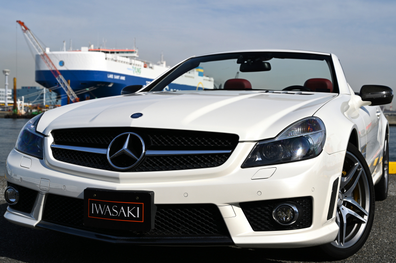 AMG SLクラス 超大人気R230後期最終モデルAMG Sl63パフォーマンスパッケージ正規ディーラー車左ハンドル法人禁煙屋根保管OPカーボンパッケージ（エクステリア＆インテリア）鍛造19インチ特注ゴールドキャリパーベンチレーターシートHDDナビ地デジBluetoothオーディオ電動バリオルーフプッシュボタンスタート等豪華装備多数必見